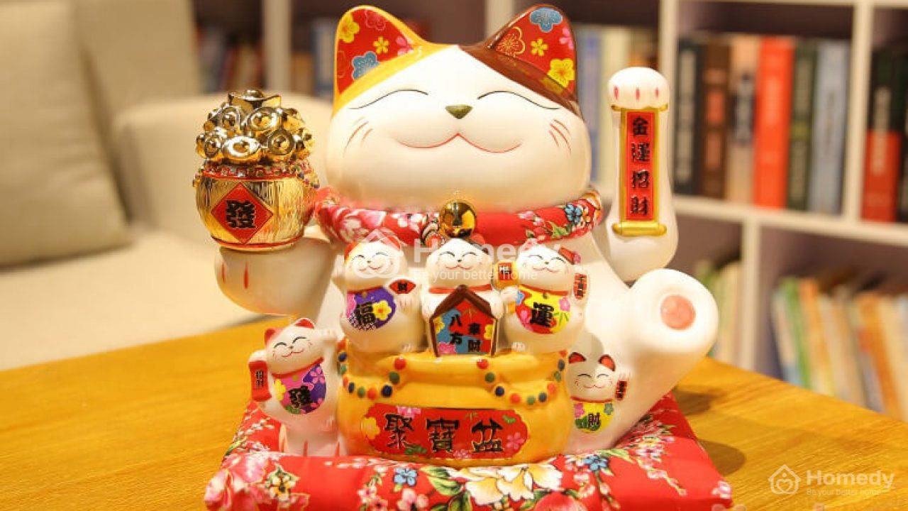 Mèo thần tài vẫy tay trái