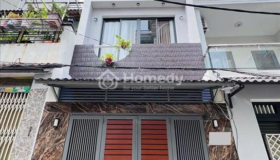 Định cư ÚC cần bán gấp căn nhà gần chợ bình chánh 1 trệt 2 lầu chỉ 890 triệu sổ hồng riêng 90m2 - Ảnh 1