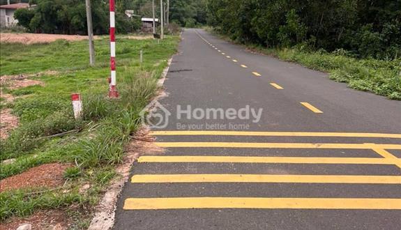 Nhà cần bán vườn sầu riêng thu hoạch hơn 3000m2 giá 1tyxx, sổ riêng. Mặt tiền đường nhựa - Ảnh 1