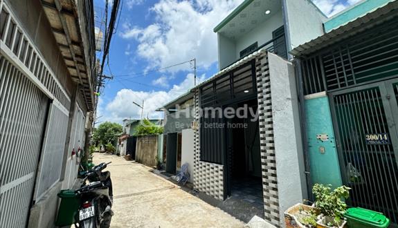 Bán nhà quận 12 đường 5m xe hơi vào tận cửa cần bán gấp - Ảnh 1