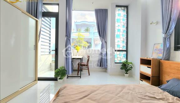 Căn hộ dịch vụ full nội thất 35m2, có ban công mát mẻ gần ngã tư Bảy Hiền, quận Tân Bình - Ảnh 1