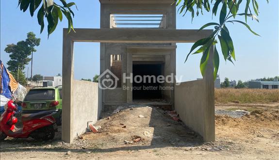 Nhà mới xây 130m2, 1 trệt 1 lửng - sổ riêng - thổ cư 100%, sát chợ, cách KCN Giang Điền 200m - Ảnh 1