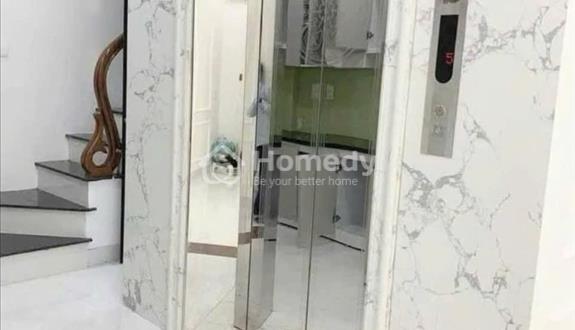 Sẵn 5 tầng 1 Tum thang máy cách đường oto tránh nhau 50m - Ảnh 1