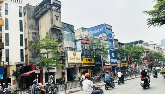 Nhà Hoàng Cầu, Đống Đa 111m2 x 4 tầng ô tô tránh, MT 5,6m, giá 32,5 tỷ - Ảnh 1