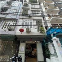 Nhà kinh doanh, gara ô tô 7 chỗ. Trung tâm quận Cầu Giấy. 6 tầng, DT 74m2, MT 4.5m. Giá 22.8 tỷ
