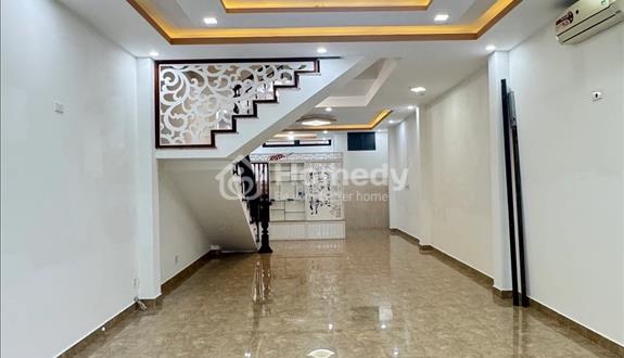 Nhà 4 tầng mặt tiền đường Mai Hắc Đế chỉ 1x tỷ - Ảnh 1