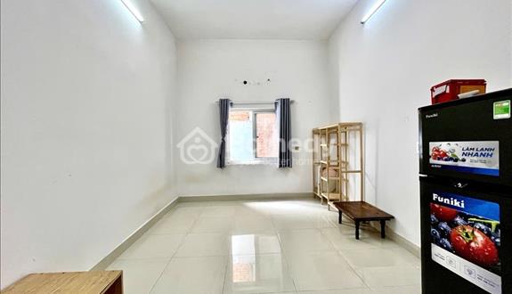 Phòng trọ giá rẻ mặt tiền đường Phú Thuận - Ảnh 1